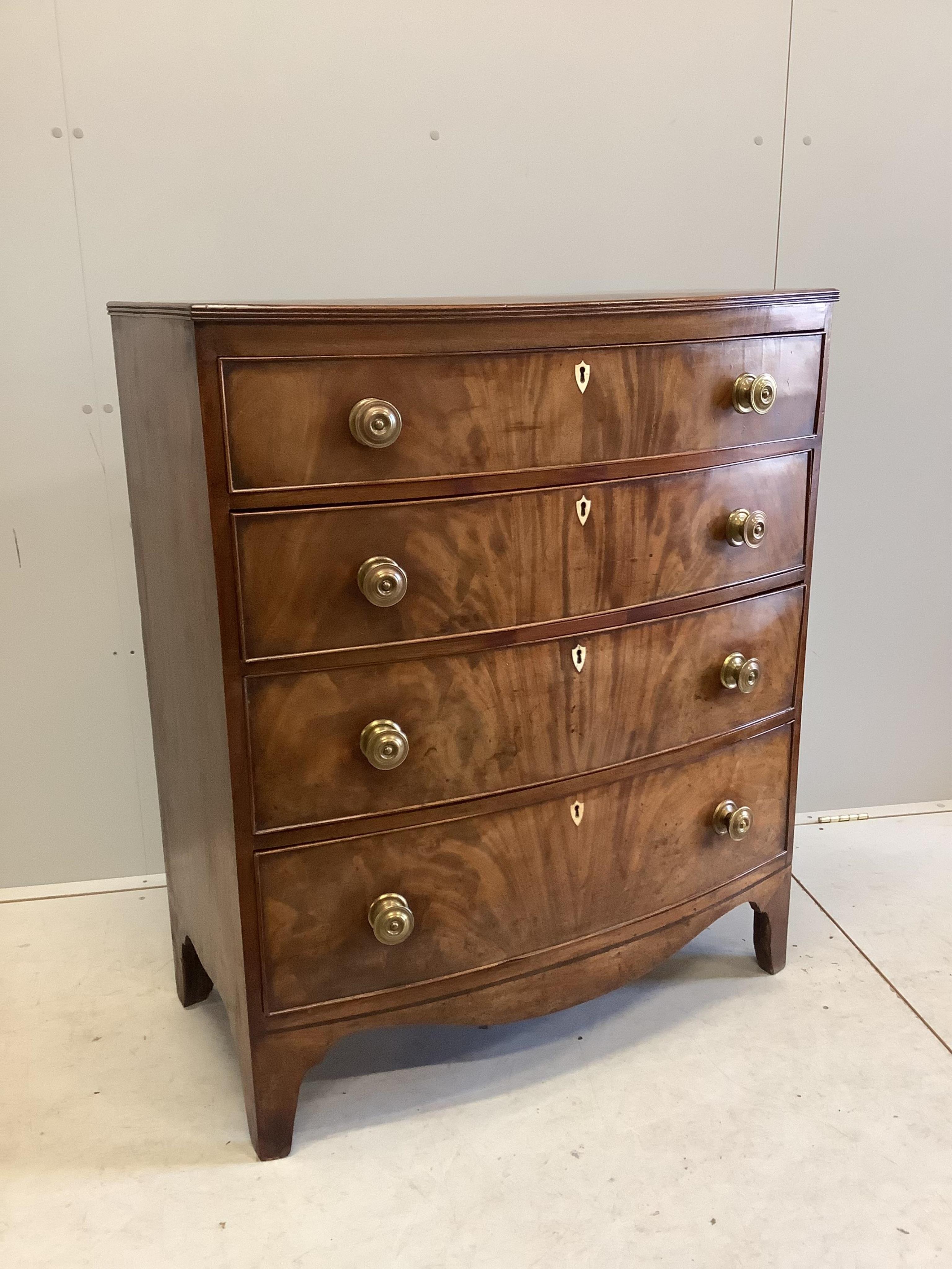 A Regency rosewood banded mahogany bowfront chest of drawers, width 90cm, depth 48cm, height 107cm. Condition - good